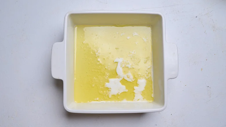 melted butter in a baking dish