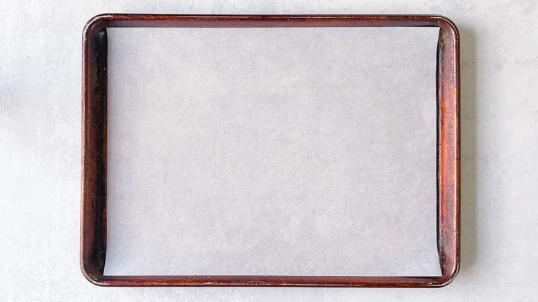 Baking sheet lined with parchment paper