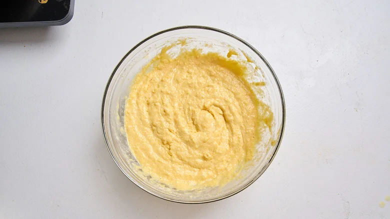 cornbread batter combined in a bowl