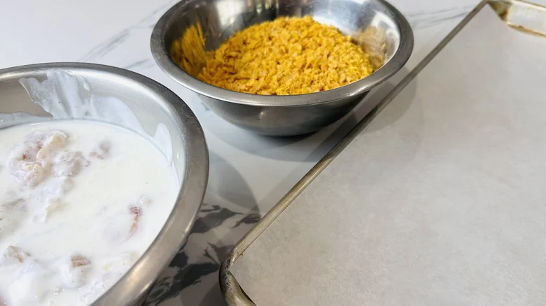 Dredging station for popcorn chicken