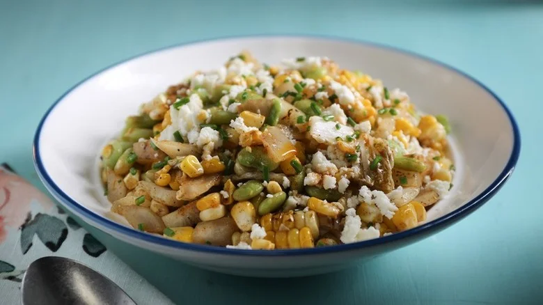 Warm Grilled Corn And Edamame Succotash Salad in a serving bowl