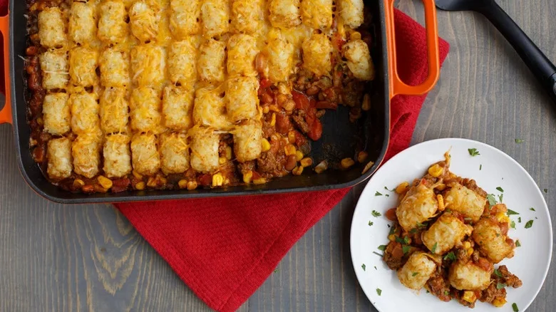 Tater Tot Casserole With Taco Seasoning in pan and on white plate