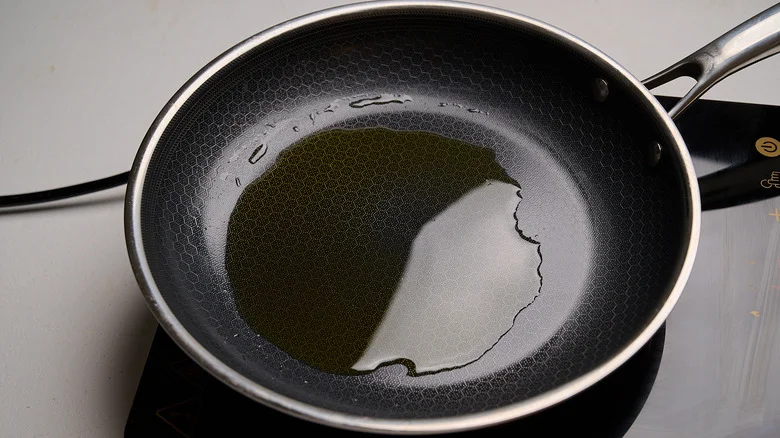 heating oil in a skillet