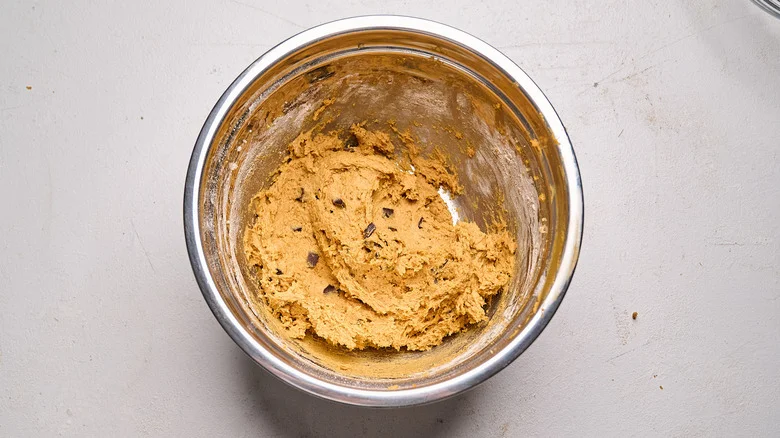 chocolate chunks stirred into cookie dough