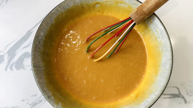 Caramel sauce and whisk in bowl