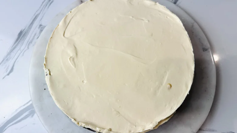 Unmolded cheesecake on plate