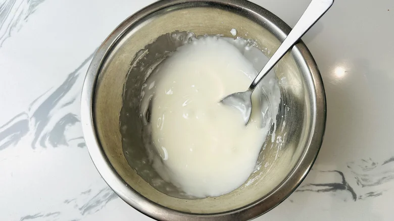 Glaze in bowl with spoon