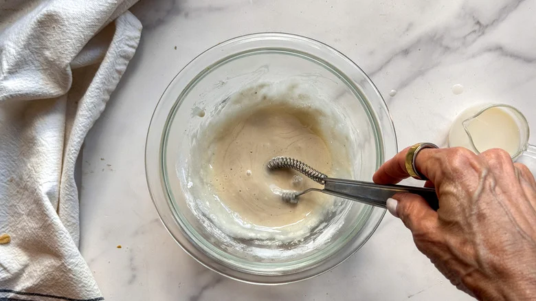 hand stirring icing