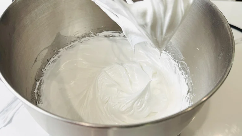 Meringue whipped to medium peaks