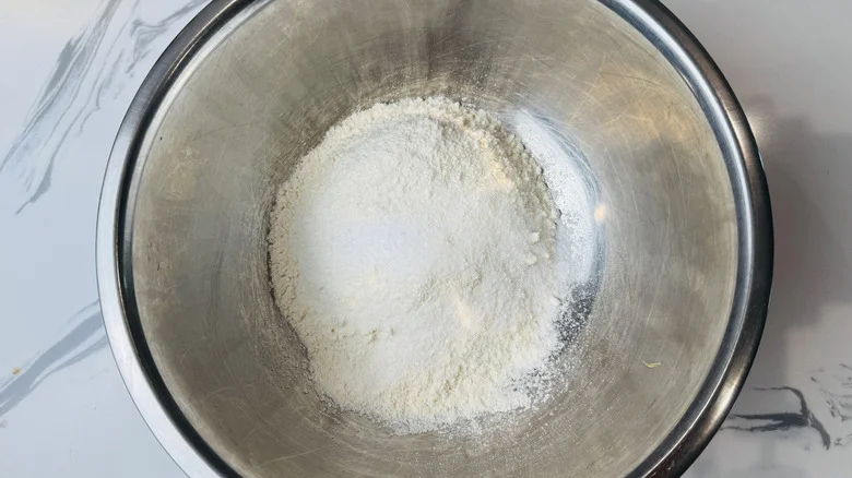 Flour, salt, and sugar in a bowl