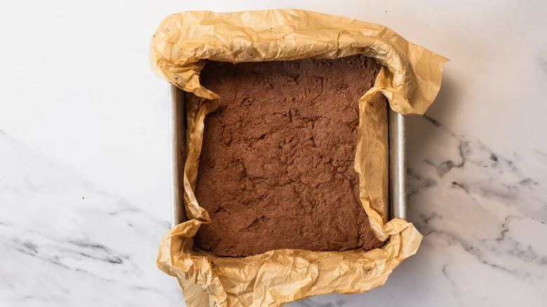 Baked chocoalte shortbread crust in square pan