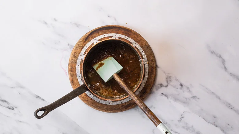 Brown sugar and butter in saucepan