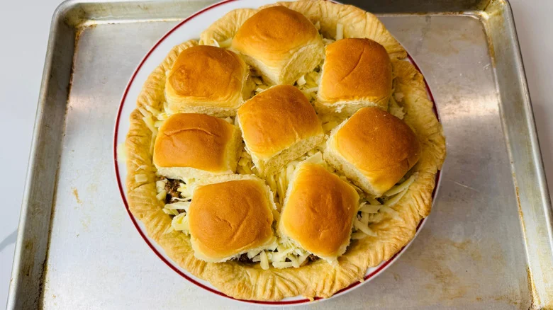 Cheeseburger pie topped with slider buns