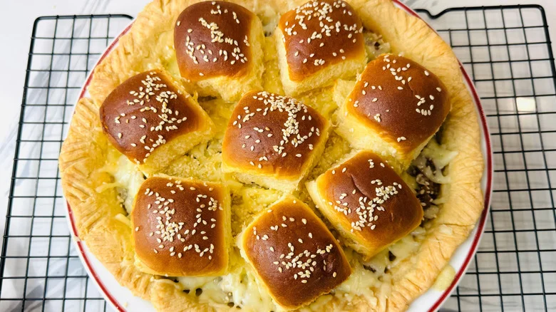 Cheeseburger pie with sesame seed slider bun topping