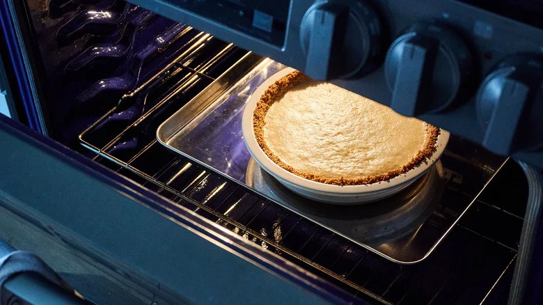 cooling the pie in the oven