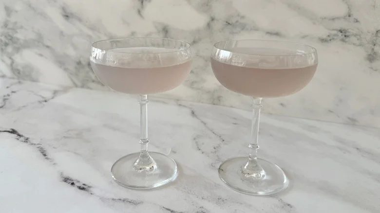 Pale purple cocktails in coupe glasses