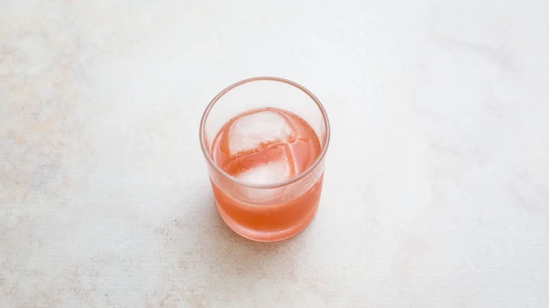 pink cocktail on marble table