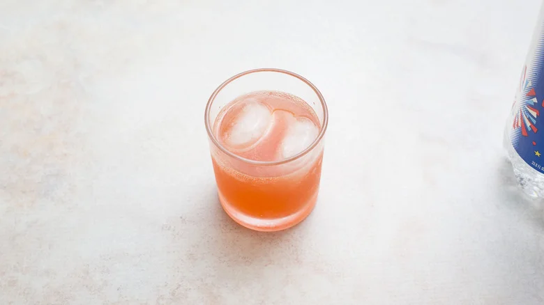 pink cocktail on marble table