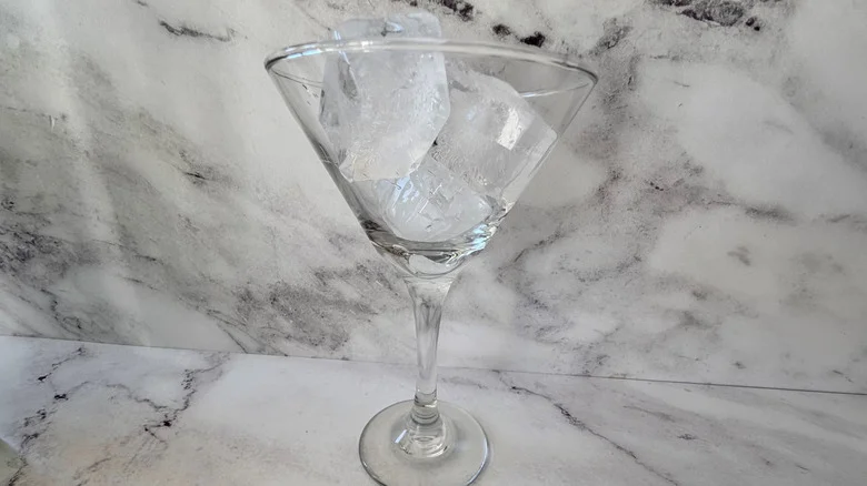 Martini glass filled with ice