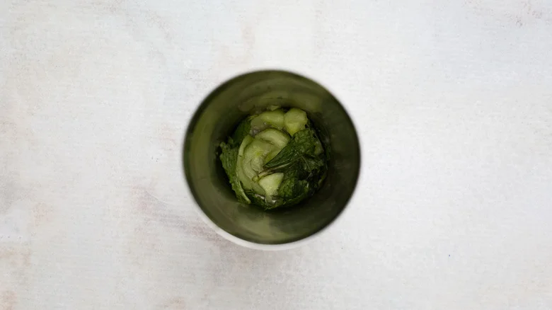 mint and cucumber in shaker