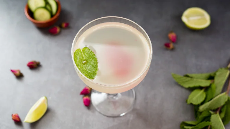 garnished cocktail on gray background