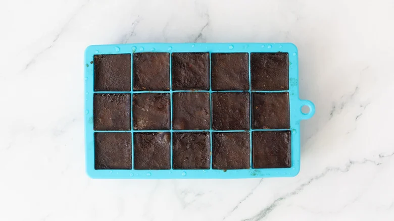 Frozen coffee ice cubes in tray