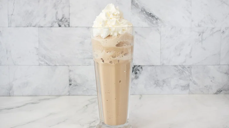 Frappe in glass with whipped cream