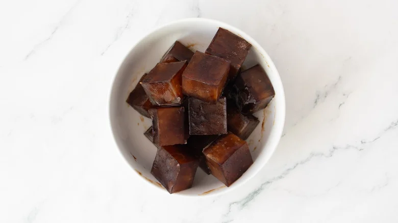Coffee ice cubes in bowl