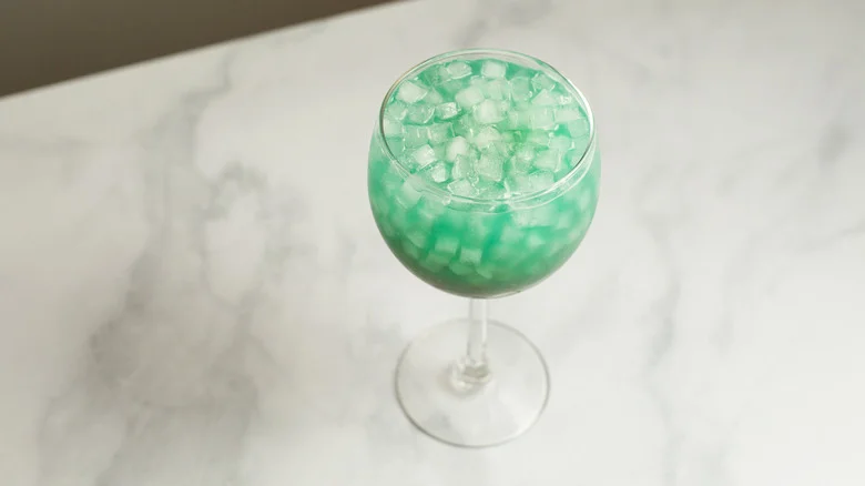 turquoise cocktail on marble table