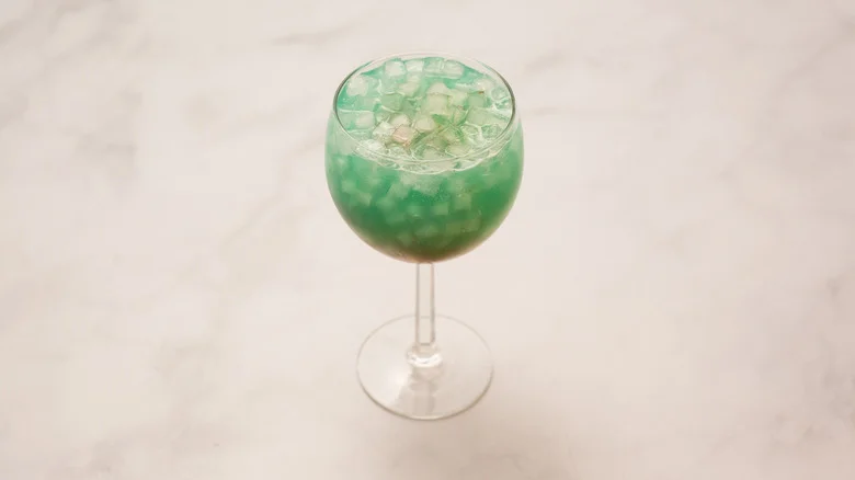 multicolored cocktail on marble table