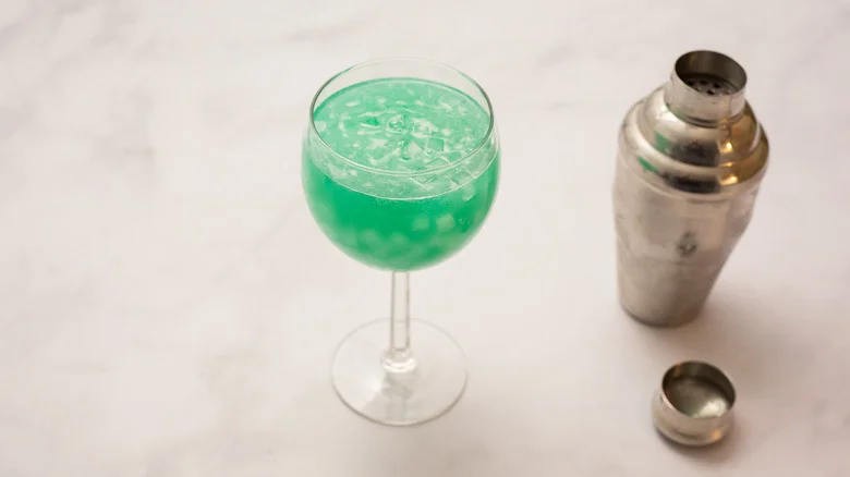 turquoise cocktail on marble table