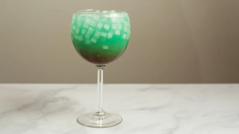 turquoise cocktail on marble table