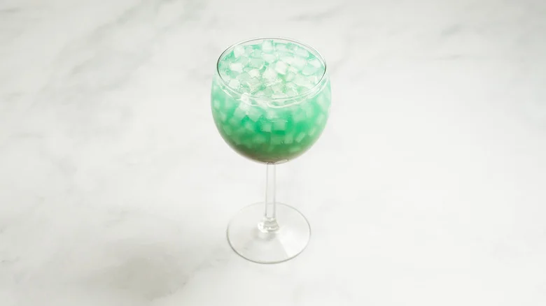turquoise cocktail on marble table