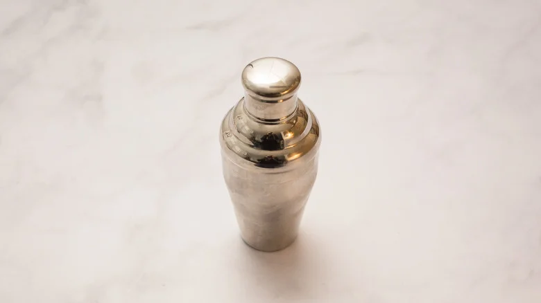 closed cocktail shaker on table