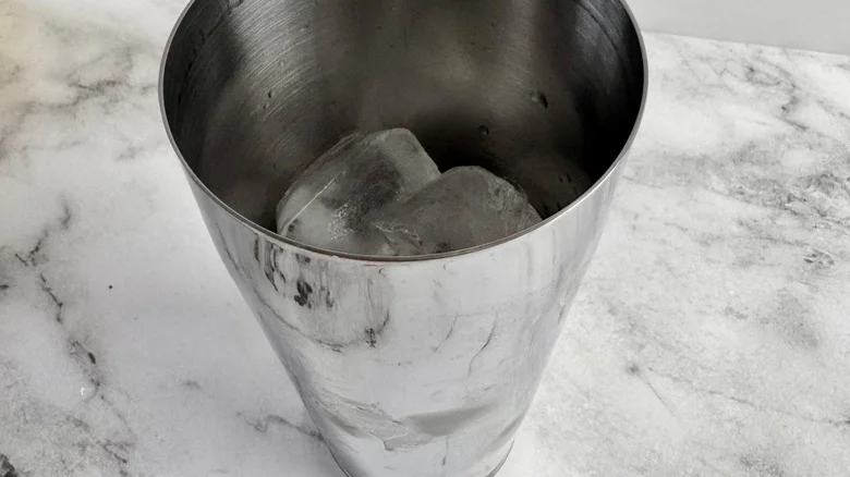 ice cubes in a metal tumbler