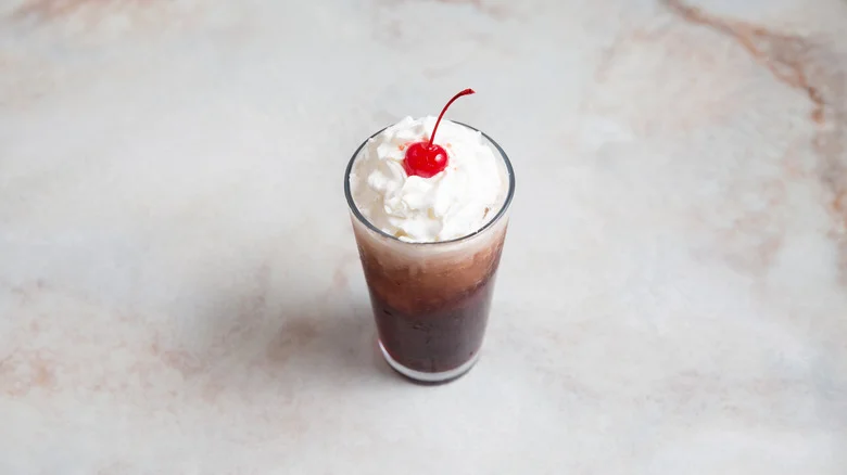 dirty soda on marble table