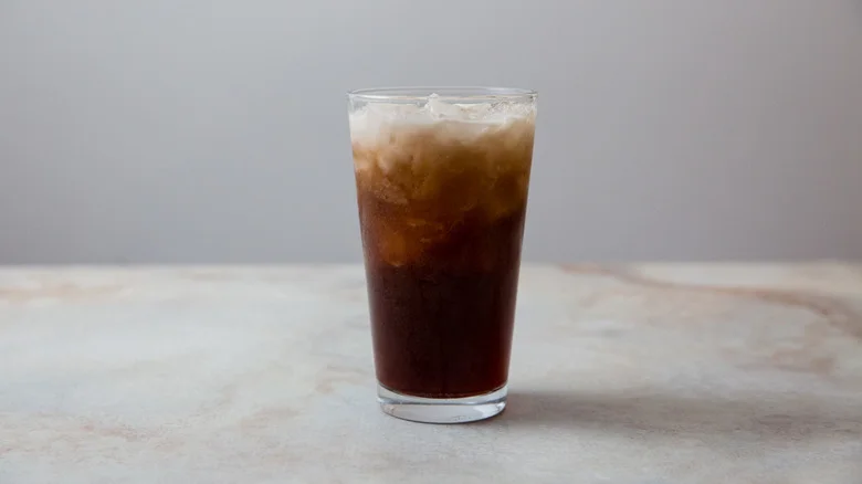 dirty soda in glass