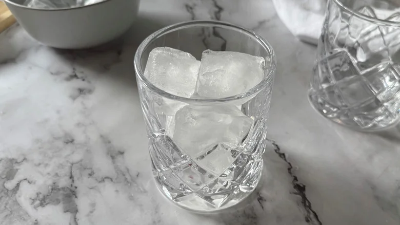 drinking glass filled with ice