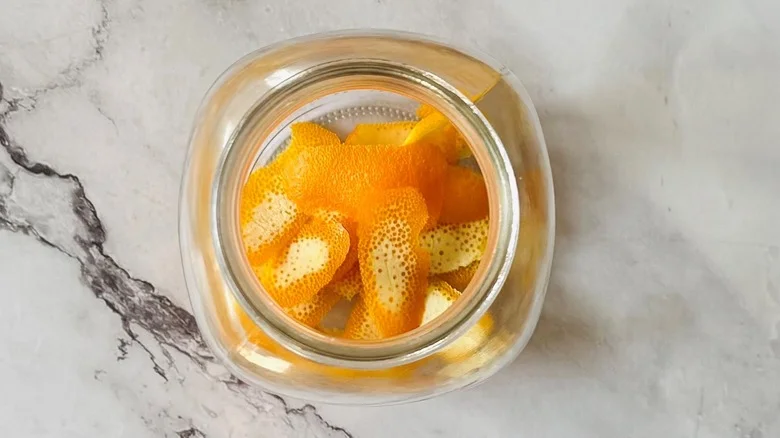 Orange peels in jar