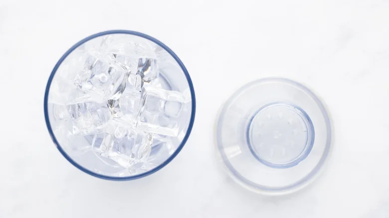 Cocktail shaker filled with ice cubes