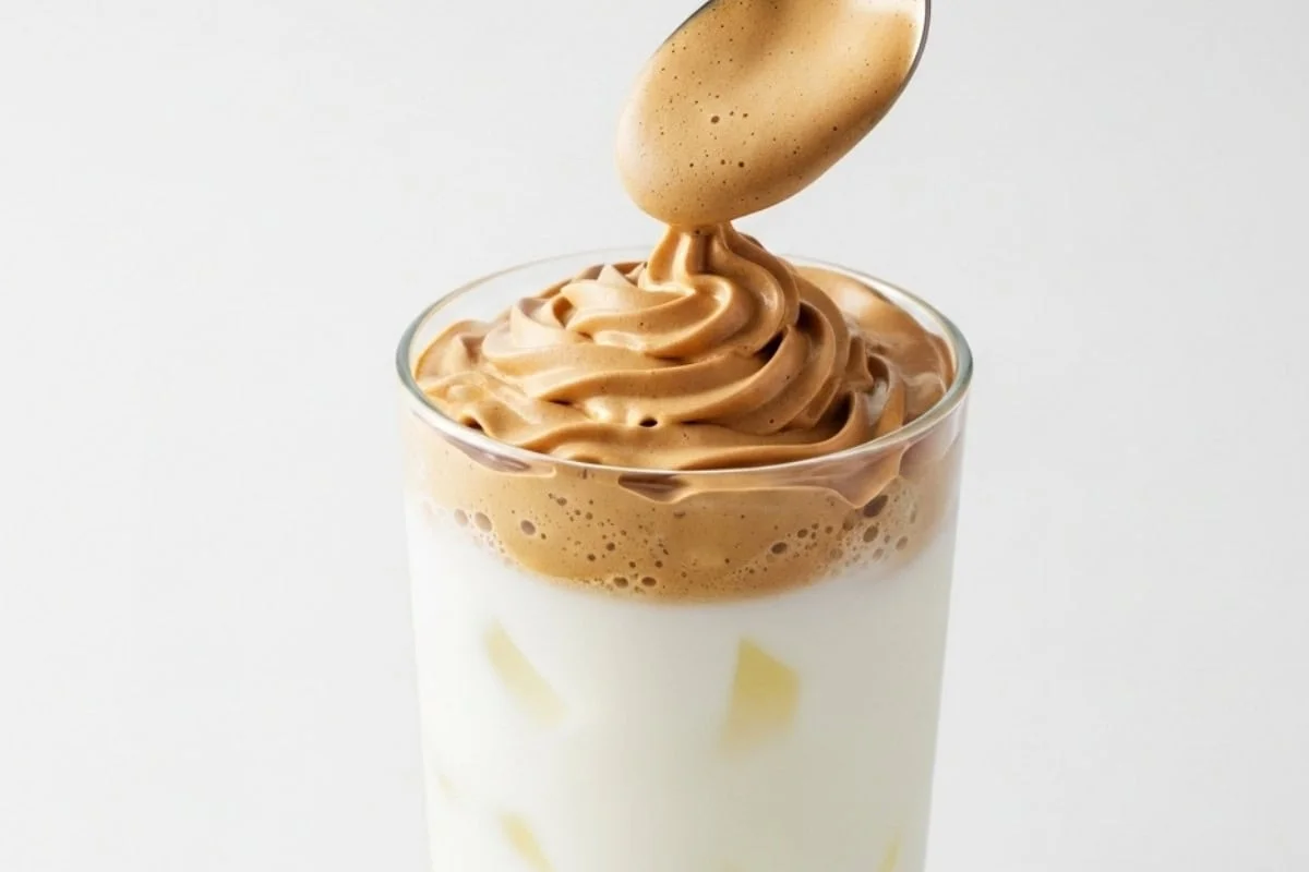 spoon the whipped coffee mixture over the milk